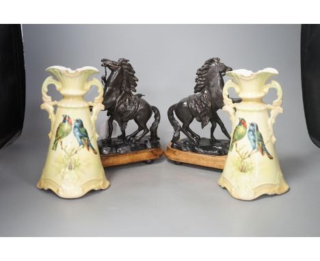 A small pair of painted spelter Marly horses and a pair of Austrian ceramic vases, tallest 23cm