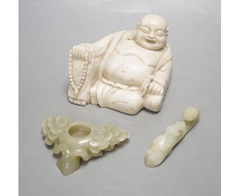 A Chinese celadon jade brushwasher, a bowenite jade belt hook and a soapstone figure of Budai,buddha 7.5 cms high.