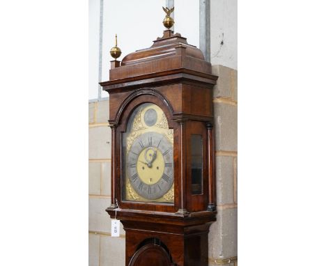 A George III feather banded walnut 8 day longcase clock, height approx. 250cm