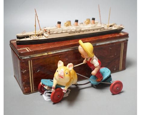 Bassett-Lowke Waterline Model Ships and a Japanned boxed celluloid ‘pig chaser’ toy, 9cms high.