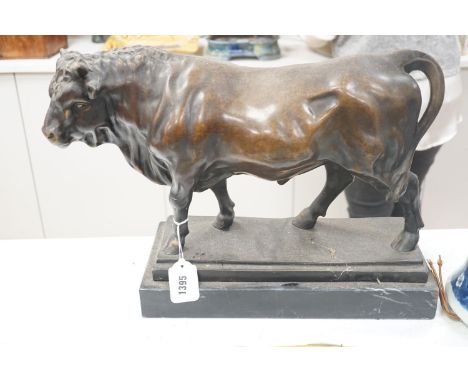 An Animalier style bronzed metal model of a bull, height 35cm