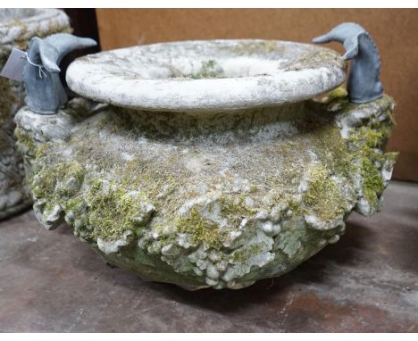 A large circular reconstituted stone ram's head garden planter / fountain head, diameter 66cm, height 42cm