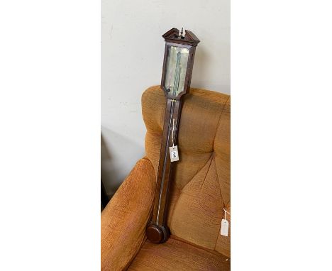 A George III mahogany stick barometer marked Manticha &amp; Co., height 96cm