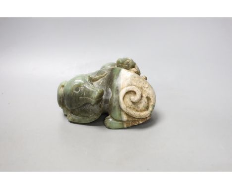 A Chinese spinach green and cream jade group of a dog and puppy,15 cms