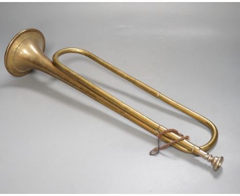 A Premier brass bugle,51 cms long.
