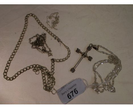 925 CRUCIFIX ON CHAIN WITH A FURTHER STERLING SILVER CROSS WITH OTHER SILVER AND METAL CHAINS
