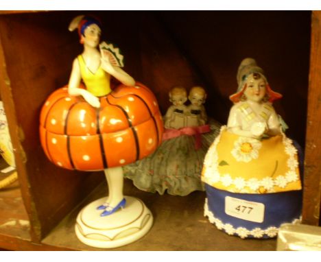 TWO CERAMIC TOPPED SOFT BOTTOMED FIGURINES PLUS DECO STYLE LIDDED POT LADY FIGURE 