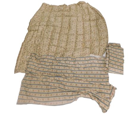 A 1930s French Provence bed cover and a pair of striped floral curtains. 
