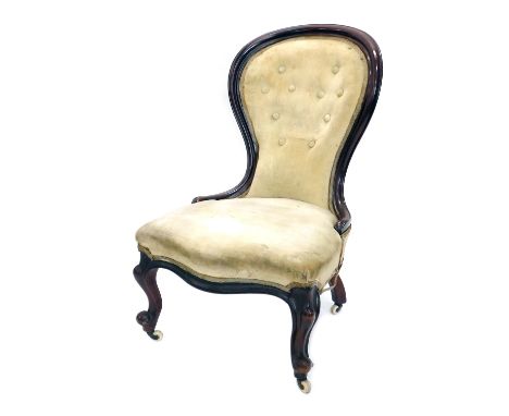 A Victorian mahogany spoon back show frame open chair, with cabriole legs terminating in castors, cream button back material,