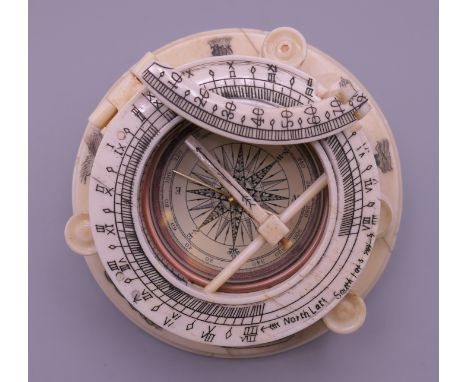 A bone compass. 10.25 cm diameter.