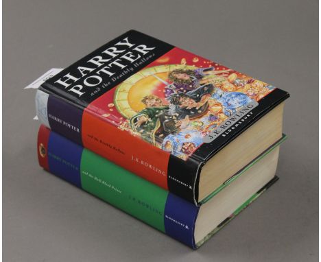 J K Rowling, Harry Potter and the Half-Blood Prince, and Harry Potter and the Deathly Hallows, both first editions.