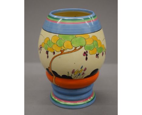 A 1930s Clarice Cliff Bizarre Tulip pattern vase. 20 cm high.