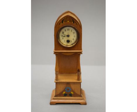 A miniature longcase clock. 