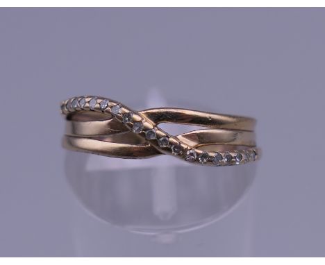 A 9 ct gold diamond ring. Ring size J/K. 2.4 grammes total weight.