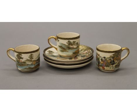 Three 19th century Japanese Satsuma cups and saucers. The cups 5 cm high.