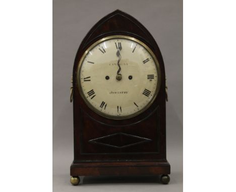 An early 19th century arched mahogany bracket clock, the dial inscribed Campbell Oswestry. 46 cm high.