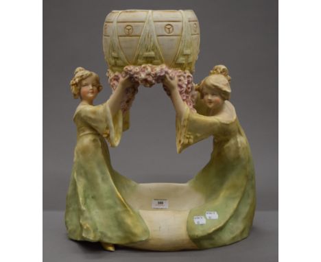 A Royal Dux porcelain planter, circa 1900. 46.5 cm high.