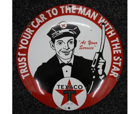 A Texaco enamel sign. 29.5 cm diameter.