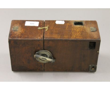 An R J Beck drop plate camera. 25 cm long.