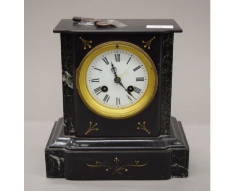 A Victorian marble mantle clock. 22 cm high.
