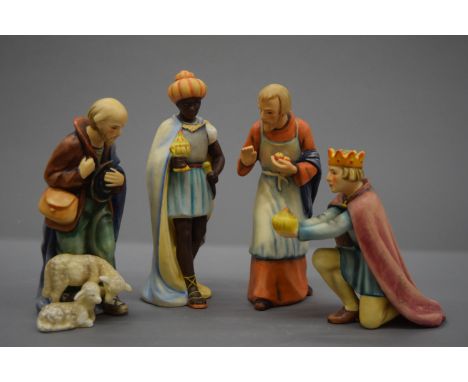 Four large Hummel figures. The largest 19 cm high.