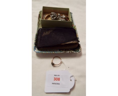 A box of assorted jewellery to include pendant, stretch bracelet, marquisette brooch, miniature autograph and sketch book and