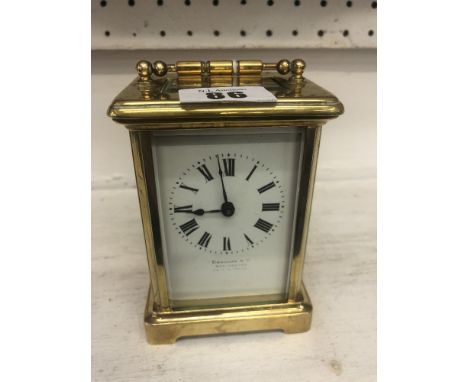 A brass cased Finnigans carriage clock