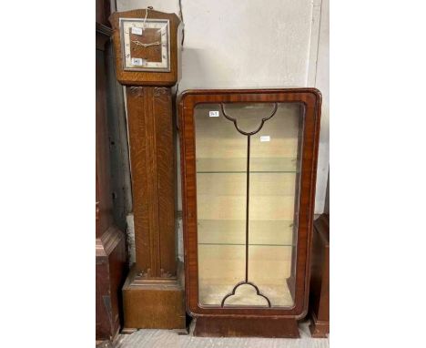 An early 20th century grandmother clock having three train striking and chiming movement, in oak case, 144.5cm high  together