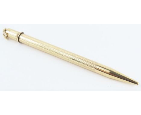 A 9ct gold propelling pencil, with engine turned decoration and hanging loop, 8.7cm long excluding loop, 11.1g gross