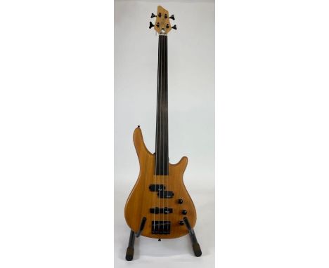 A Stagg electric bass guitar