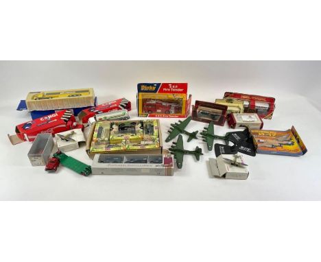 A quantity of boxed vehicles to include a Dinky ERF Fire Tender and others