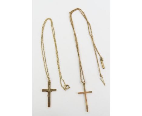 A 9ct gold crucifix and a cross marked '9ct', and a chain marked '9ct'; and an unmarked chain, tests as 9ct gold, 8.23g gross