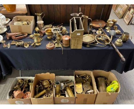 A very large quantity of mixed brass and copper including brass motor horn, copper bugle, candlesticks, bellows and similar
