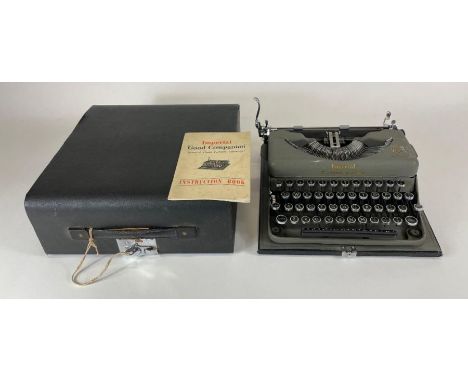 An Imperial “Good Companion” portable typewriter in original case with instruction book