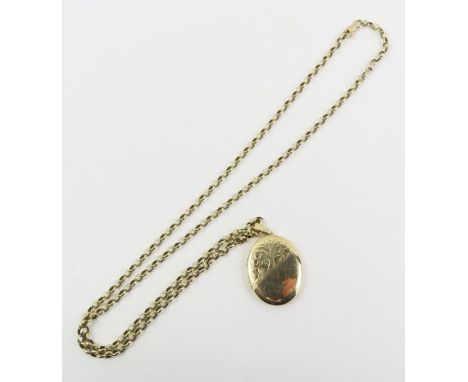An oval 9ct gold half patterned locket, and a belcher chain, marked '375', 60cm long,16.91g gross
