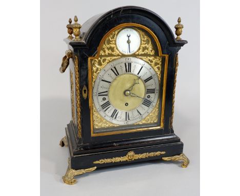 A good 18th century style ebonised bracket clock by Johnson Longford, with twin fusee movement, the gilt brass arched face wi