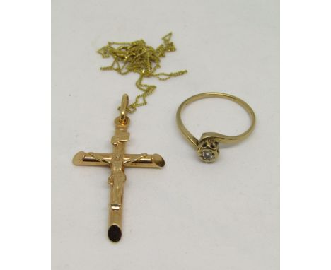 9ct diamond set crossover ring, size L, together with a 9ct crucifix pendant on associated fine link necklace, 3.5g total