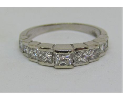 14ct white gold princess cut diamond ring set with nine graduated stones, centre stone 0.20cts approx, size J, 2.4g