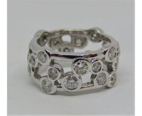 Diamond bubble ring in unmarked white metal, size I/J, 6.5g (some stones af)