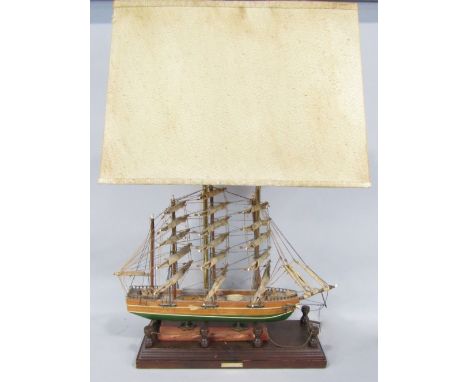 Scratch built model of a clipper ship converted into a twin branch table lamp upon a wooden plinth base, with plaque inscribe