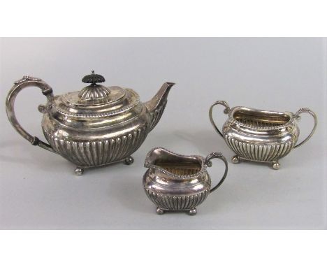 Turn of the century silver three piece bachelor tea service with half fluted decoration, maker JD &amp; S, Sheffield 1900, th