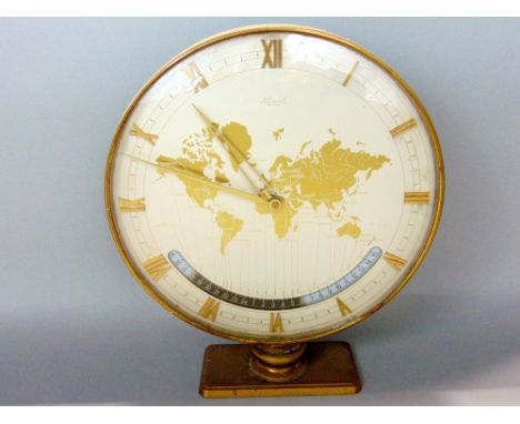 1960s Kienzle world time GMT brass glazed mantle clock, the dial decorated with a gilt map of the world with subsidiary time 