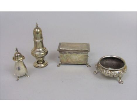 A silver casket shaped jewellery box with engine turned decoration and lined interior, baluster shaped pepperette, another sm