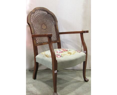 A Victorian mahogany Pembroke table fitted with one real and one dummy frieze drawer raised on ring turned and tapered suppor