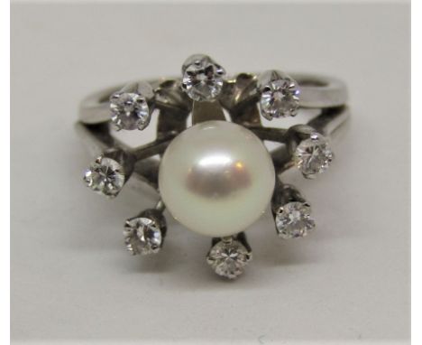 Pearl and diamond dress ring in unmarked white metal, size I/J, 6.1g