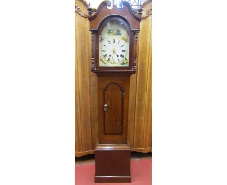 A Regency cottage longcase clock the oak case crossbanded in walnut, the hood with arched outline and swan neck cornice and e