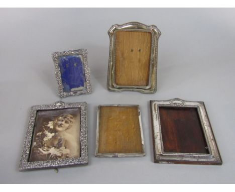 Five silver applied easel picture frames