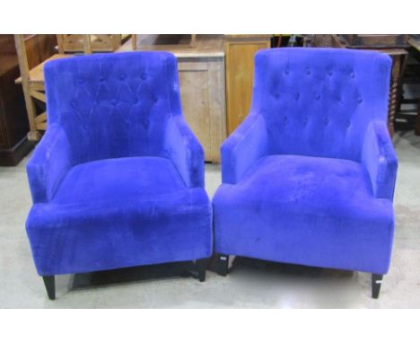 A pair of good quality contemporary purple velvet upholstered drawing room chairs with shaped outline and button back raised 