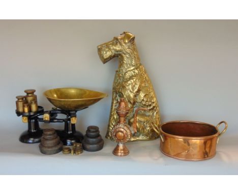 A large cast brass terrier fireside companion, copper pan, set of brass and iron balance scales, weights, etc