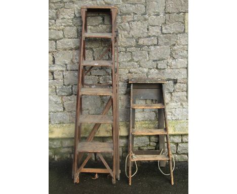 A vintage pine folding step ladder, with Jones patent fittings, together with one other (sold for display purposes only)